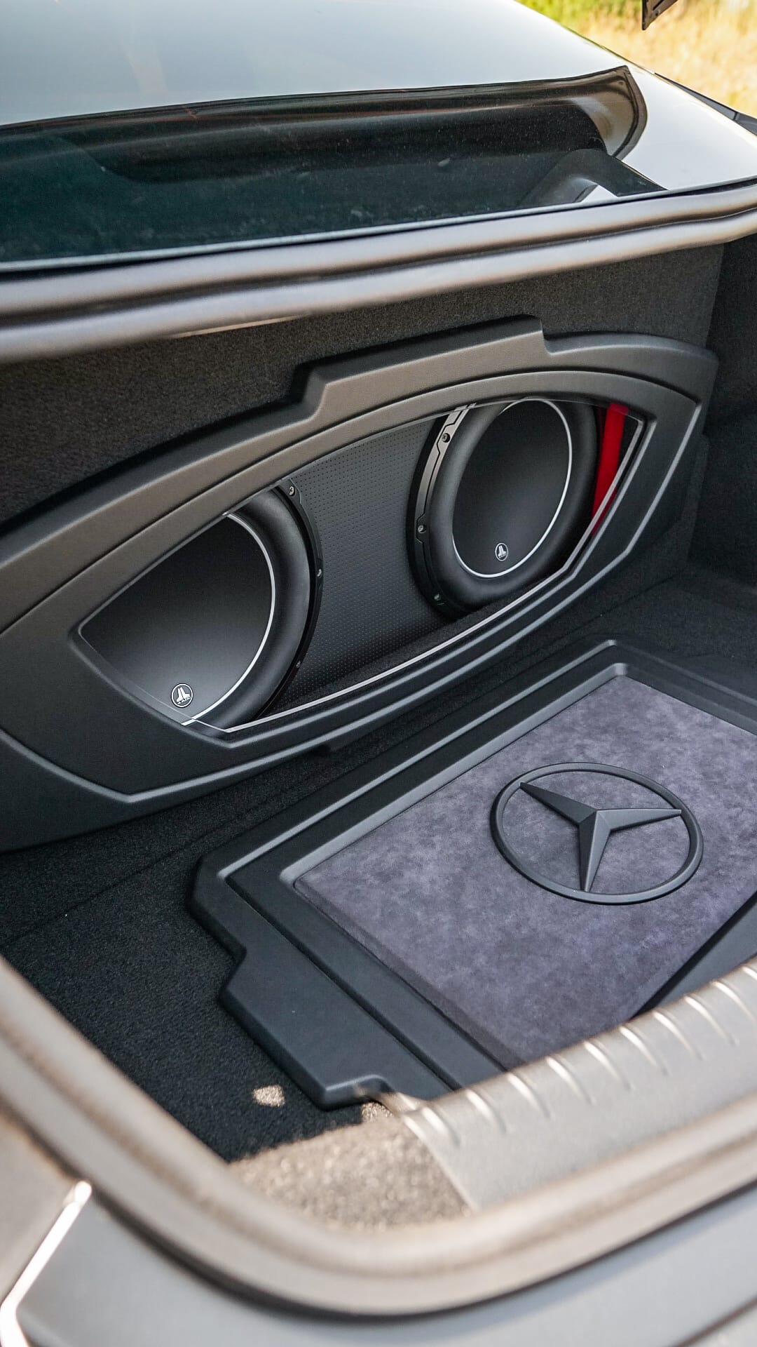 Custom JL Audio dual subwoofer install in Mercedes trunk