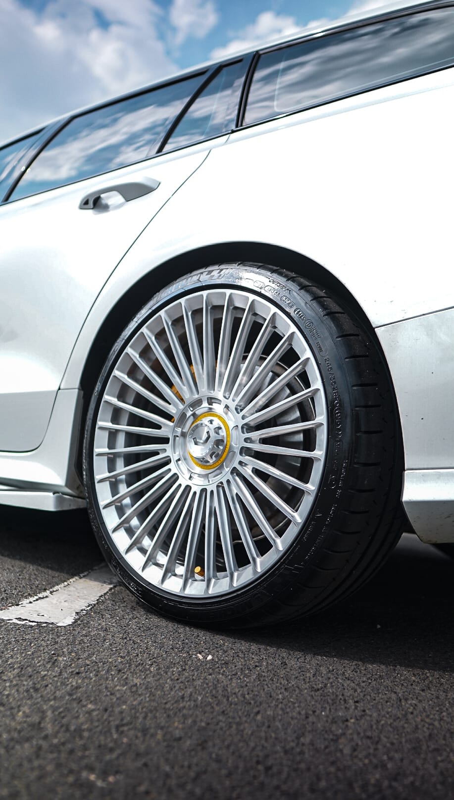 Rear polished wheel on silver wagon